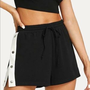 Black drawstring side button shorts